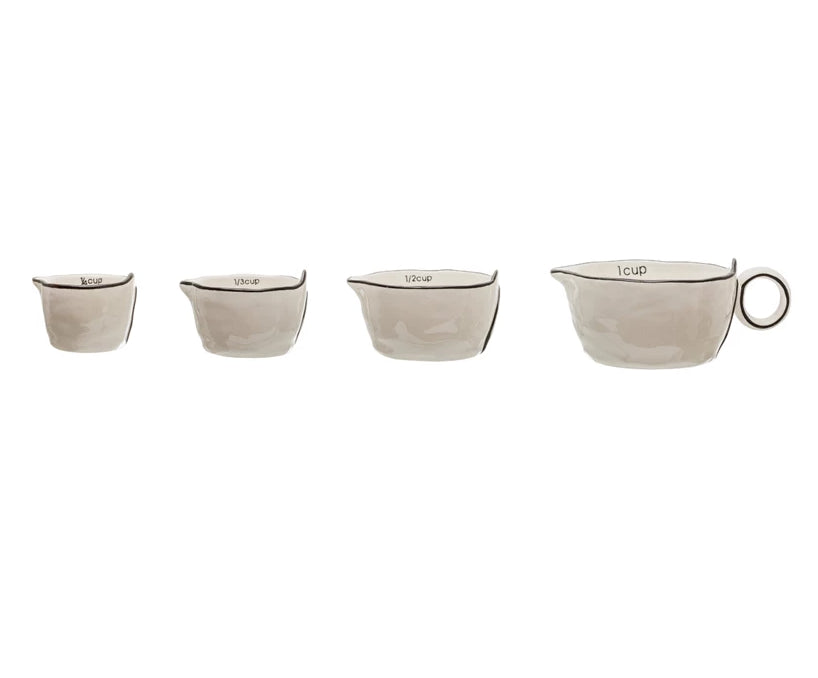 White and Black Rimmed Measuring Cups