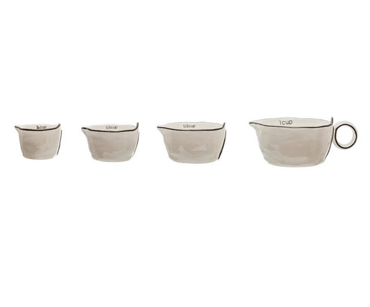 White and Black Rimmed Measuring Cups
